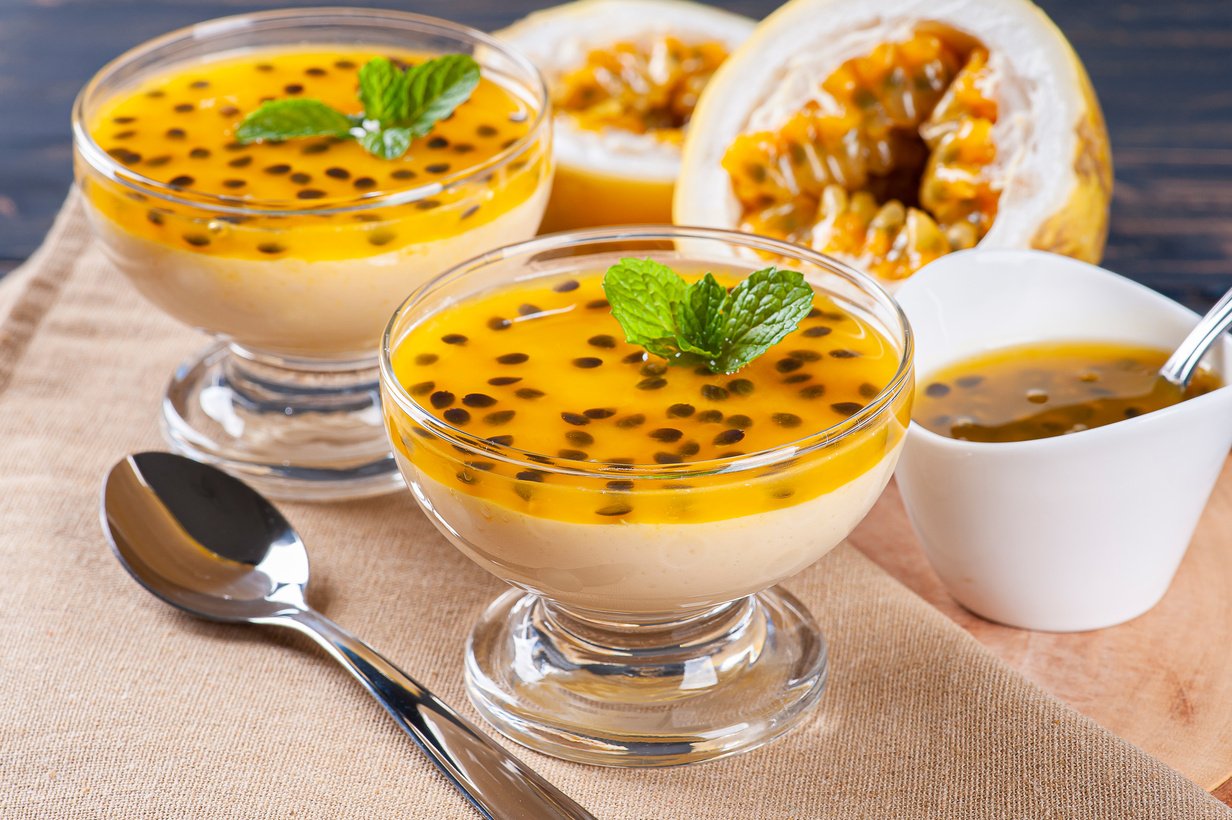 Passion fruit mousse. Refreshing dessert with fresh passion fruit topping